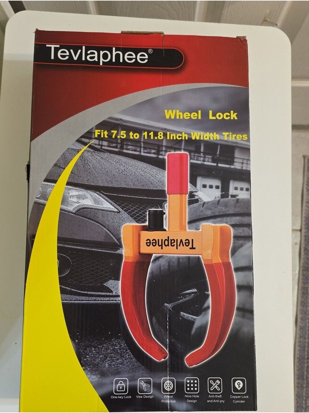 Tevlaphee Wheel Lock Clamp in Red and Orange